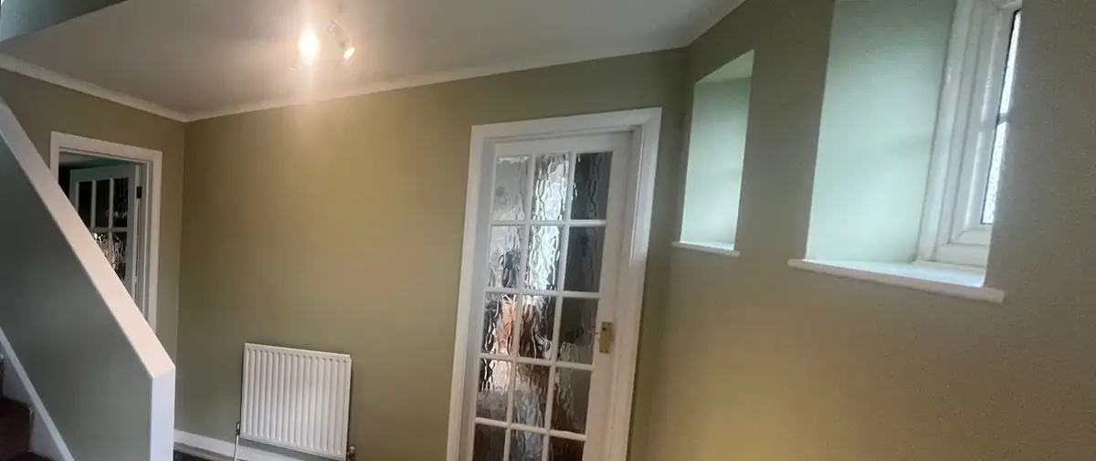 Hall and stairs after redecoration in green