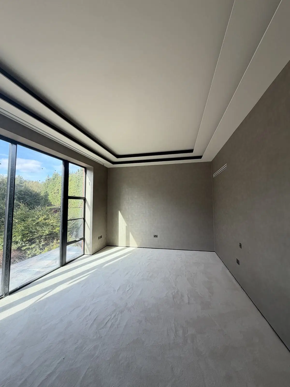 Lounge with a coffered ceiling